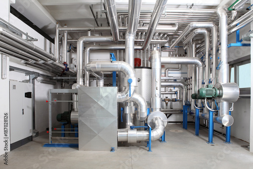 central heating and cooling system control in a boiler room photo