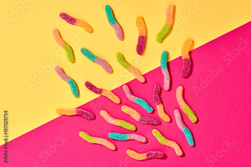 Gummy Candies background, Sweets. Flat lay. Summer Party, Pink Birthday Firework. Bright Colorful Layout. Fun Trendy fashion Style. Minimal. Pop Art