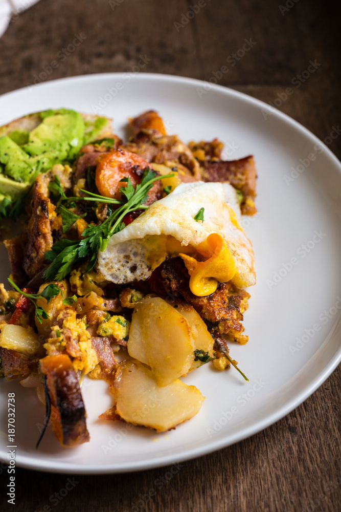 big cooked breakfast, bubble and squeak with fried egg and avo o big cooked breakfast, bubble and squeak with fried egg and avo o
