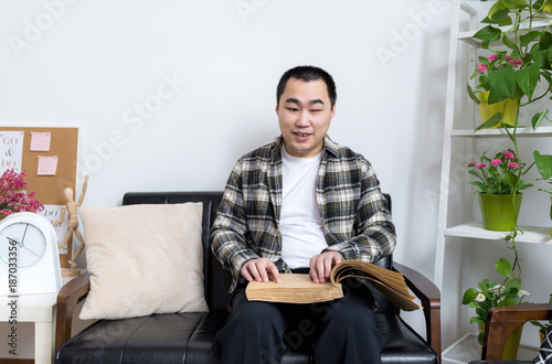 Blind man reading braille