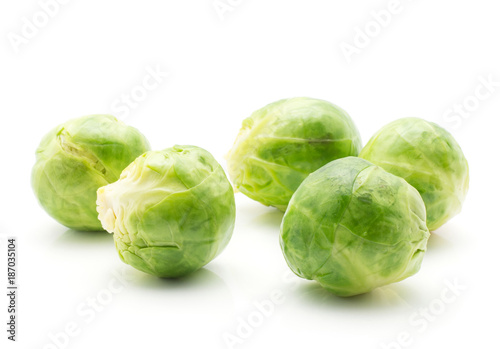 Boiled Brussels sprout isolated on white background five whole heads.