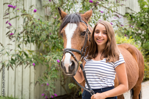 Teenage Girl With Her Pony