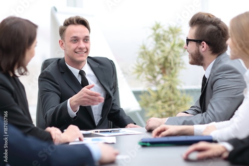 businessman at a meeting with employees