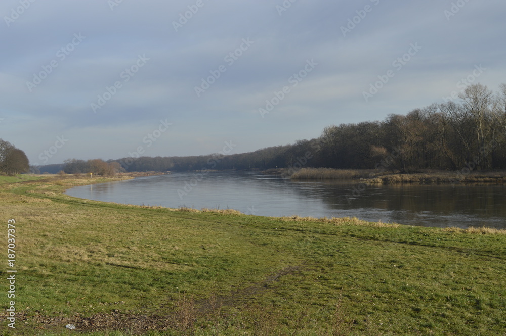 Poland, Nowa Sol: The transshipment port in the autumn and winter landscape on Oder River