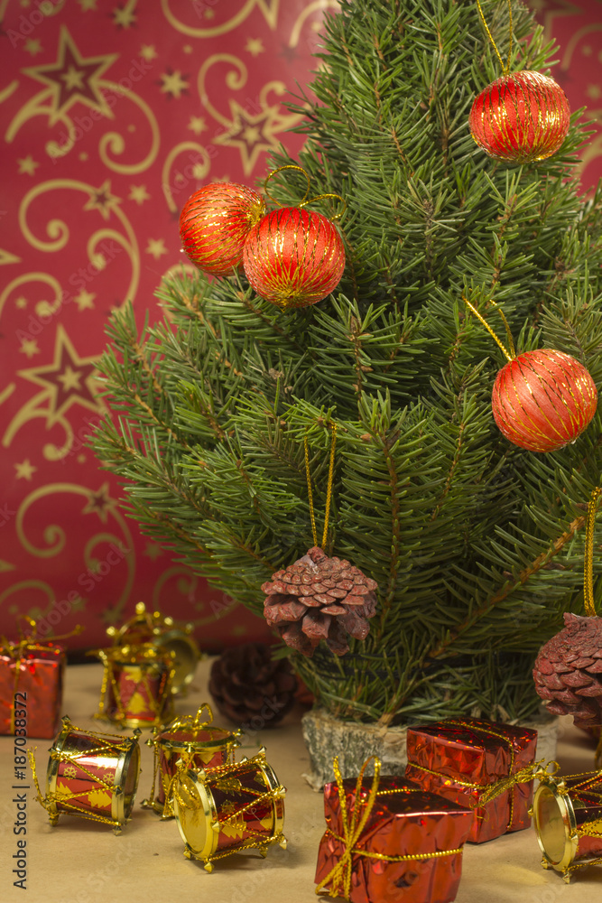 Christmas tree with toys on a red background Christmas tree with toys on a red background