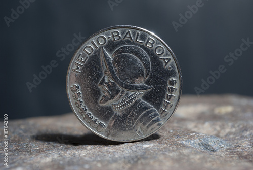 Obraz na płótnie Half Balboa coin, panama 1982, currency over stone texture.