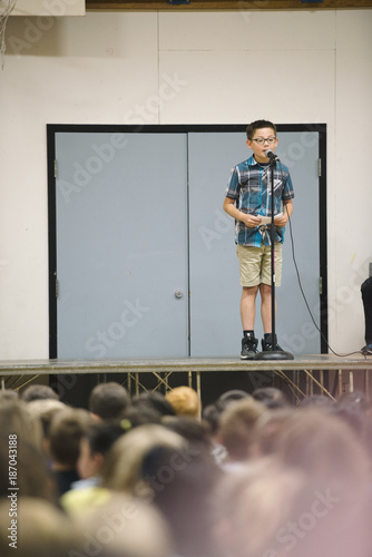 Boy Giving Speech at School photo