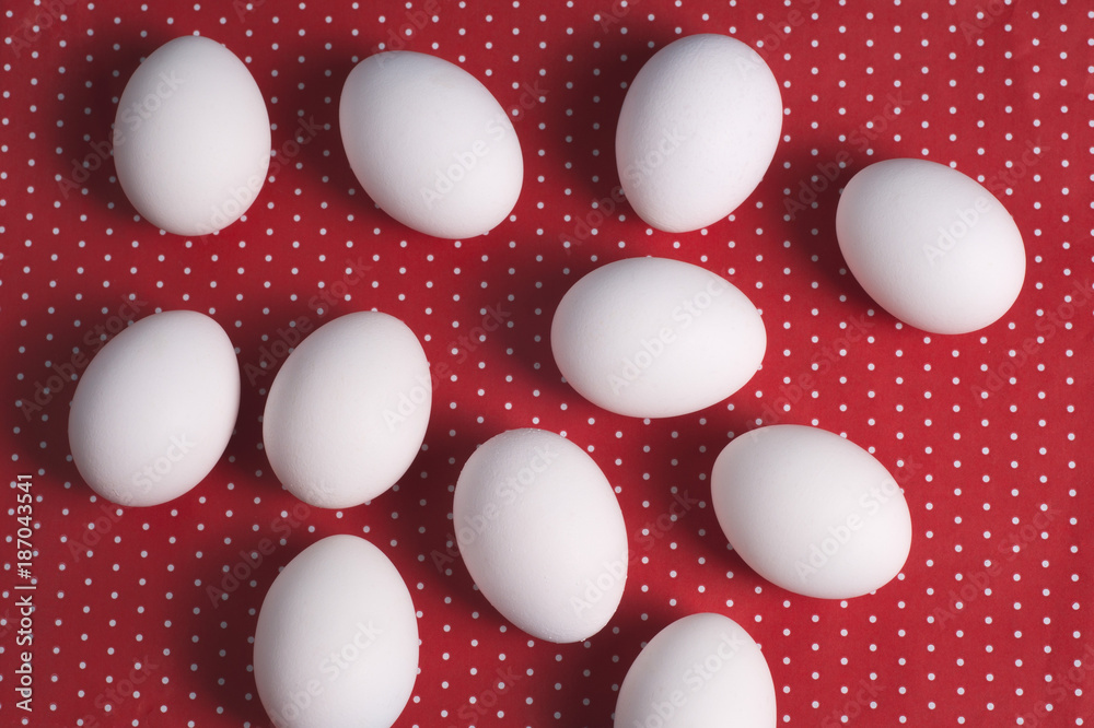 Easter eggs on a red and white background Easter eggs on a red and white background