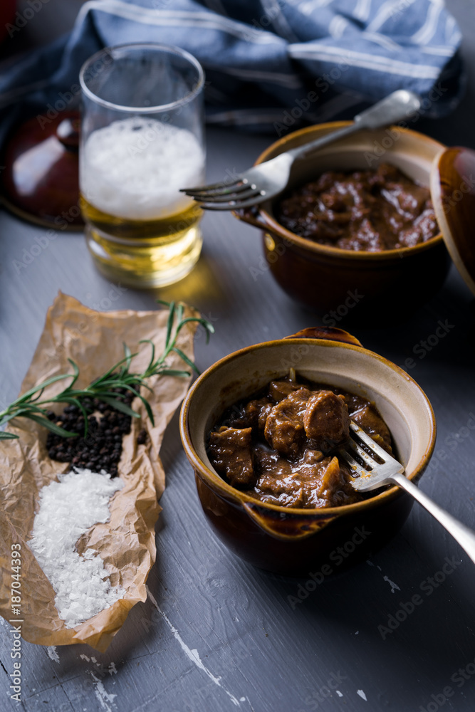 Beef and mushroom stew served in individual bowls. Beef and mushroom stew served in individual bowls.