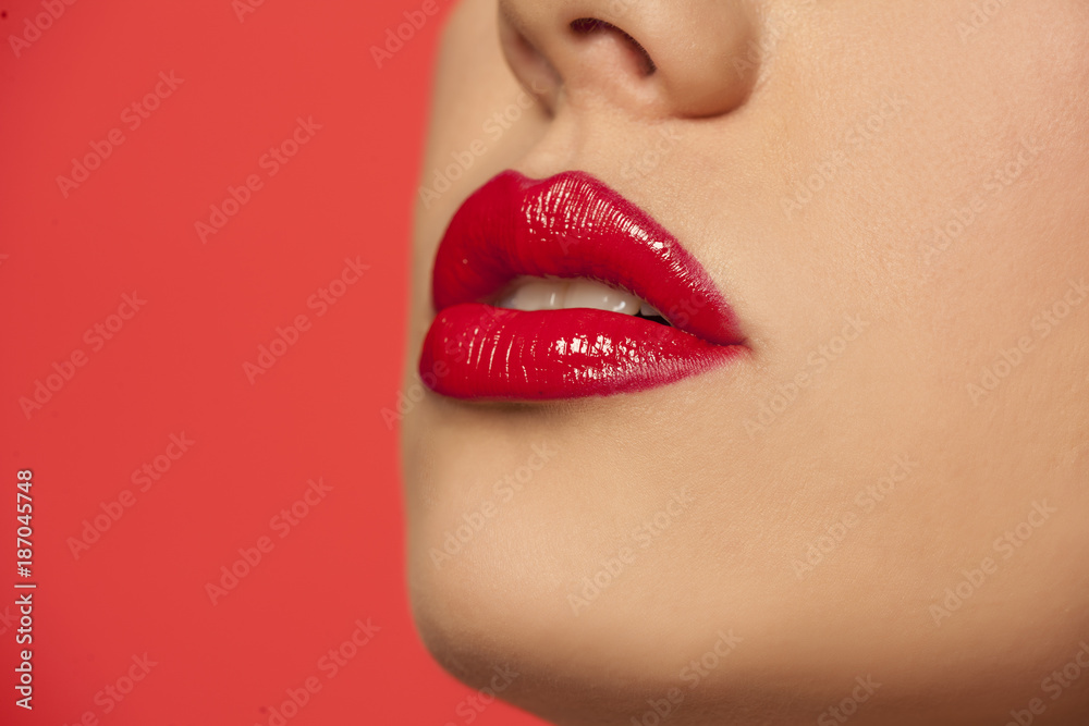 woman's lips with red lipstick woman's lips with red lipstick
