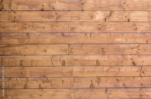 Yellow wooden plank wall texture for usage as background