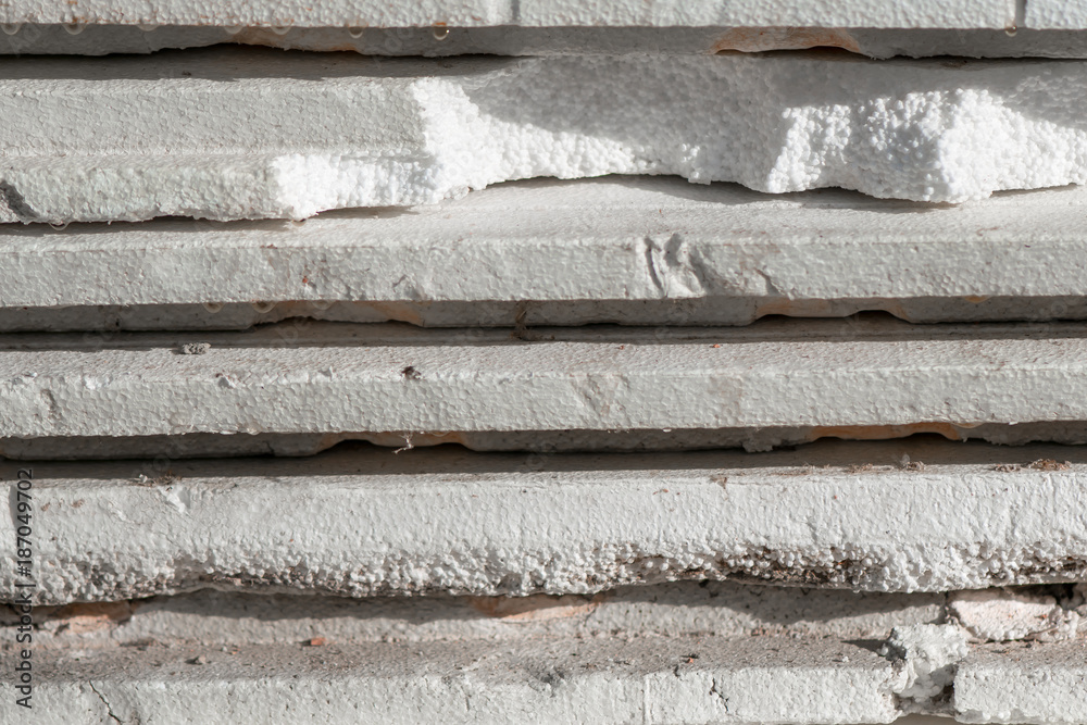 Polystyrene foam. White background. Dirty and old foam sheets. Polystyrene foam. White background. Dirty and old foam sheets.
