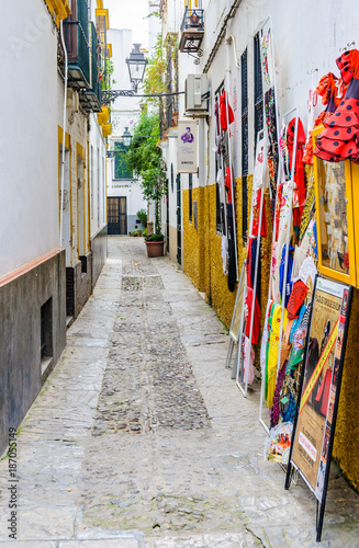 Cobblestron street in the Jewish neighborhood in Seville, Spain © kovgabor79
