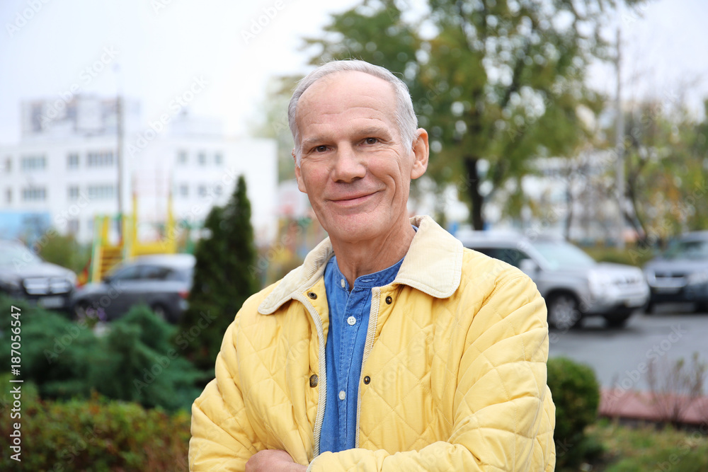 Charismatic senior man outdoors Charismatic senior man outdoors