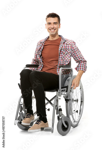 Konstfotografi Young man in wheelchair on white background