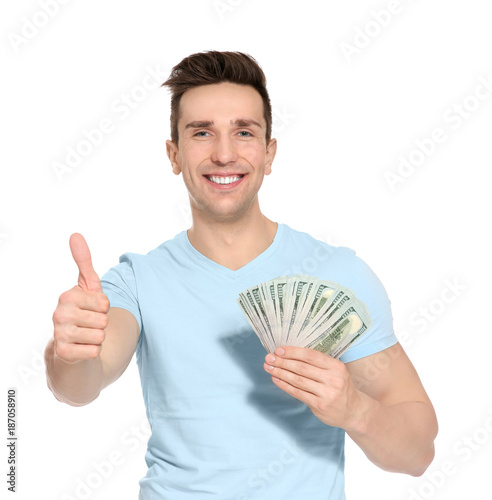 Man with money on white bac...