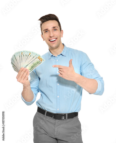 Man with money on white bac...