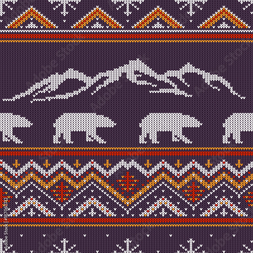 Winter knitted woolen pattern with polar bears on a background of snow-capped mountains