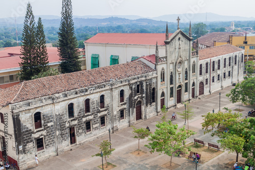 LEON, NICARAGUA - APRIL 25, 2016: View of Colegio La Asuncion school on Parque Central square in Leon, Nicaragua.
