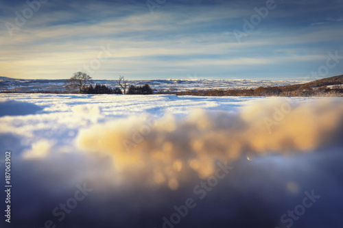 Winter Landscape with Deep Snow in Morning Light