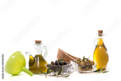 Fototapeta Naklejka Na Ścianę i Meble -  Green and black olives with olive oil bottles