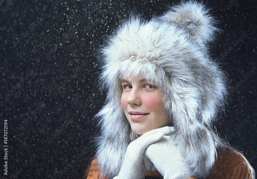 Teenage girl with a fur cap Teenage girl with a fur cap