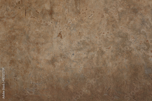 A yellowish mottled wall background