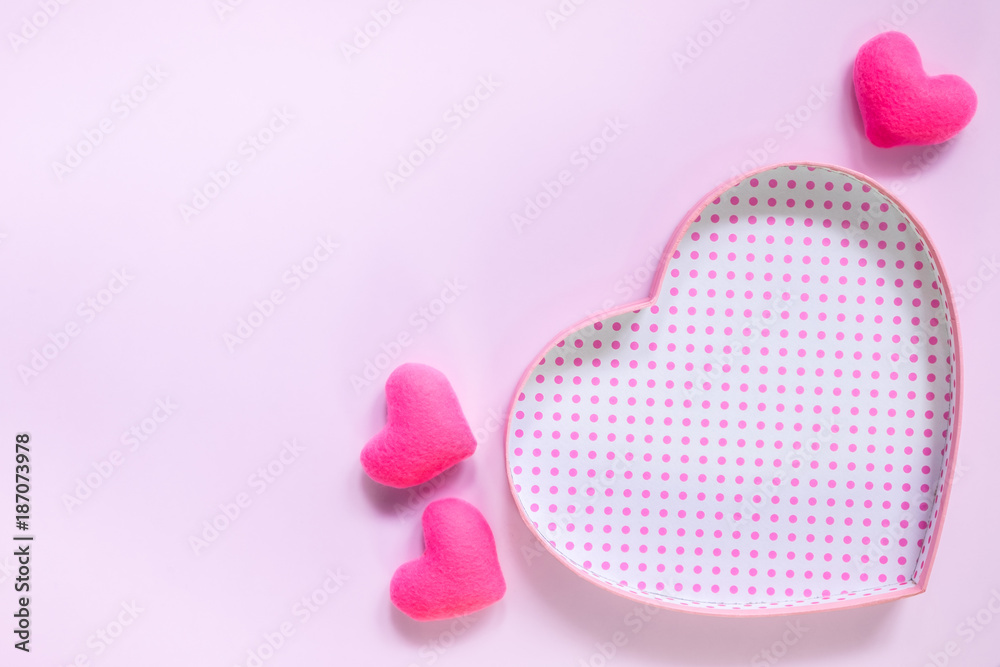 Top view of flat lay mockup with romantic decoration Romantic, St valentine's day concept with valentines mini pin heart on pink background with copy space minimal style. Top view of flat lay mockup with romantic decoration Romantic, St valentine's day concept with valentines mini pin heart on pink background with copy space minimal style.