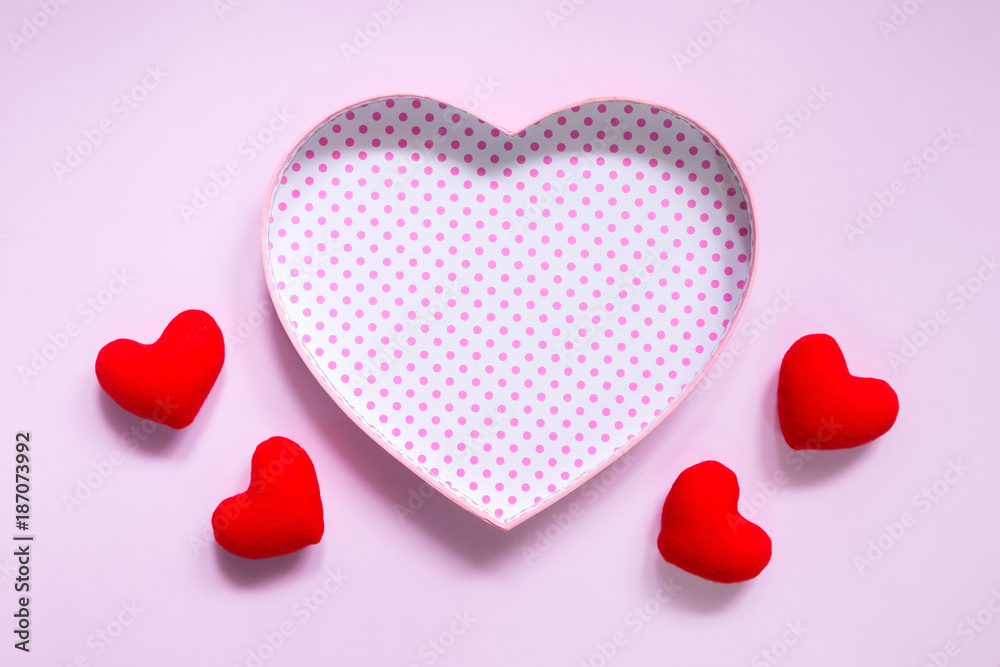Top view of flat lay mockup with romantic decoration Romantic, St valentine's day concept with valentines mini pin heart on pink background with copy space minimal style. Top view of flat lay mockup with romantic decoration Romantic, St valentine's day concept with valentines mini pin heart on pink background with copy space minimal style.