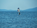 Windsurfer in blue scene