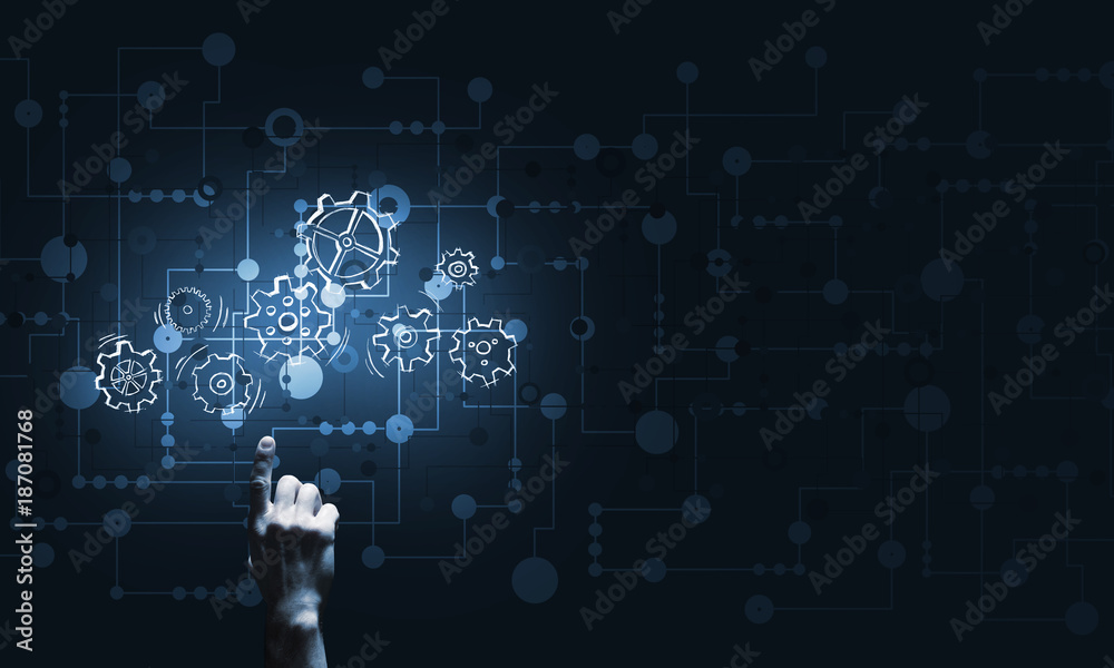 Glowing cogwheel mechanism icon on dark background as symbol of teamwork Glowing cogwheel mechanism icon on dark background as symbol of teamwork