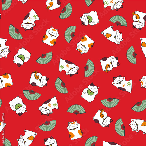 seamless pattern a set symbol maneki neko the attracting cat of good luck with the paws raised up the Japanese tradition and open fan on red background