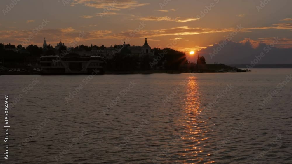 Beautiful sunset on the waterfront. City center. The sea, the river. Beautiful sunset on the waterfront. City center. The sea, the river.