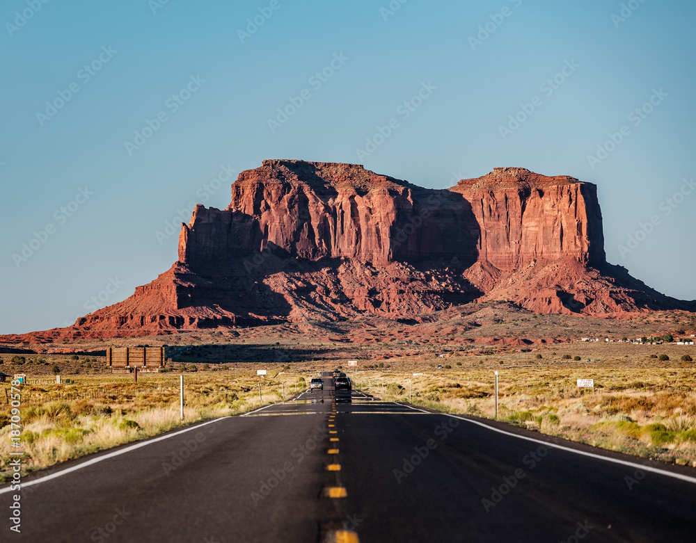 Empty scenic highway in Monument Valley Empty scenic highway in Monument Valley