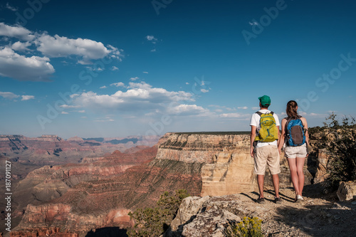 Tourists with backpack hiking at Grand Canyon