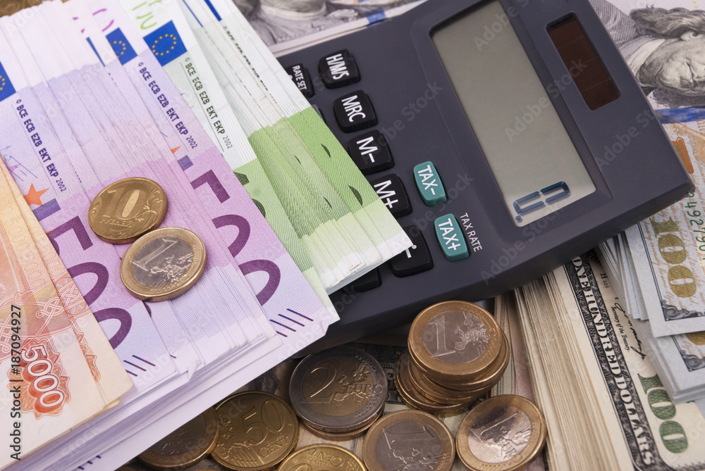 Dollar, euro, ruble banknotes, calculator, coins Stock Photo | Adobe Stock