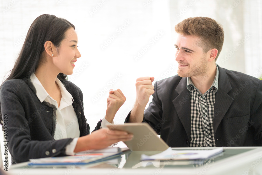 Young professionals work in modern office.Project manager team discussing new idea Young professionals work in modern office.Project manager team discussing new idea
