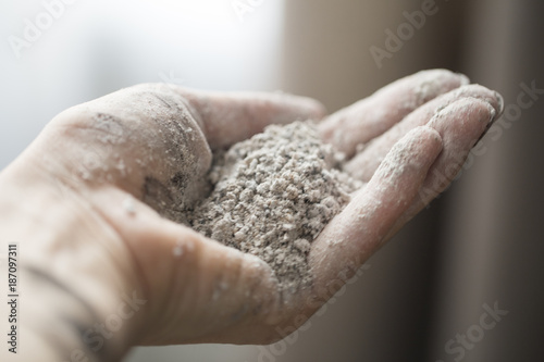 ashes in a female hand.the ash on his hands photo