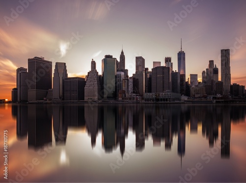NEW YORK, UNITED STATES OF AMERICA - APRIL 28, 2017: New York City Manhattan skyline panorama with skyscrapers building at dusk. © kapros76