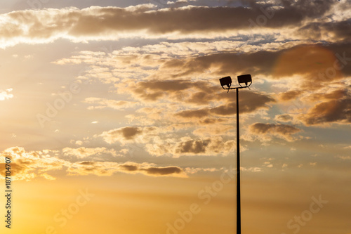 Stadium spotlight sunset