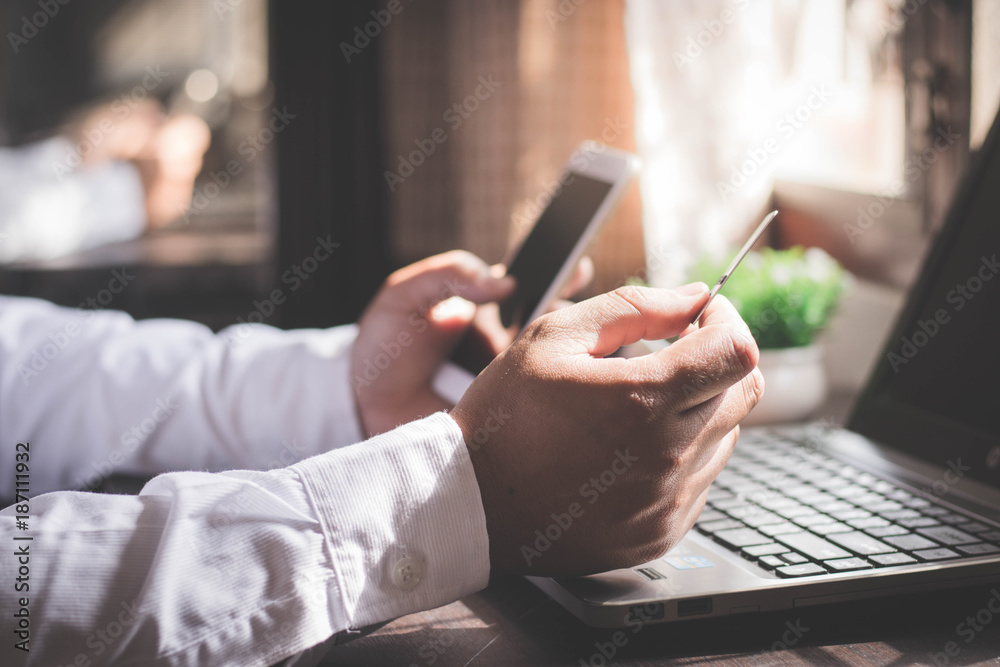 Man using mobile phone to online shopping and pay by credit card. Man using mobile phone to online shopping and pay by credit card.
