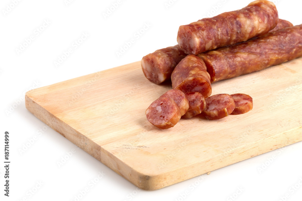 Chinese sausage and chinese sausage sliced for cook isolated on a white background Chinese sausage and chinese sausage sliced for cook isolated on a white background