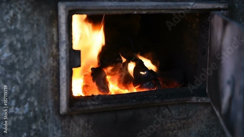 coal burns in the old Russian stone furnace