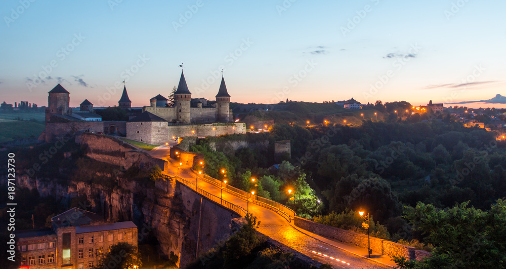 View on the castle in Kamianets-Podilskyi in the evening. Ukraine