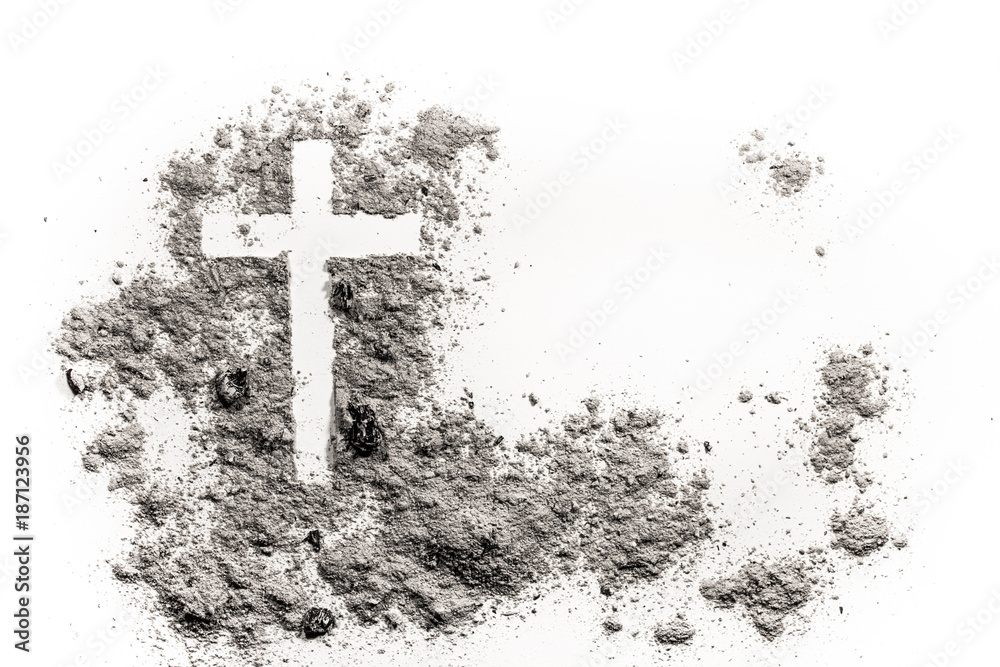 Naklejka premium Christian cross or crucifix drawing in ash, dust or sand