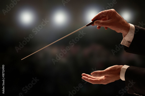 Conductor conducting an orchestra