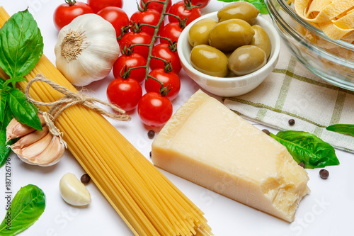 Fettuccine and spaghetti, vegetables with ingredients for cooking pasta