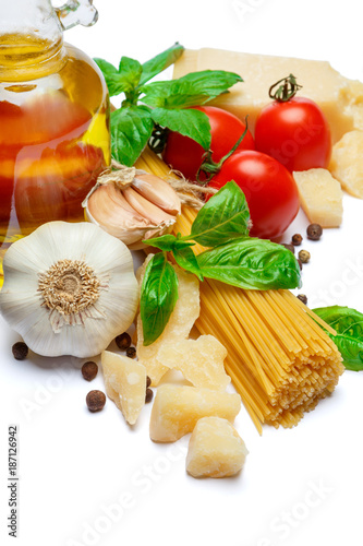 Traditional italian products - pasta, parmesan cheese, tomatoes, olive oil