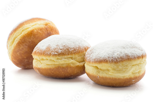 Three traditional doughnut (Sufganiyah) isolated on white background fresh baked with powered sugar without hole.