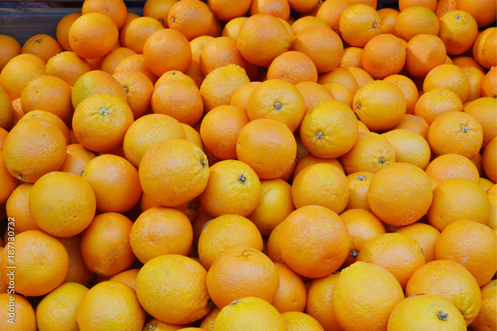 many oranges at market